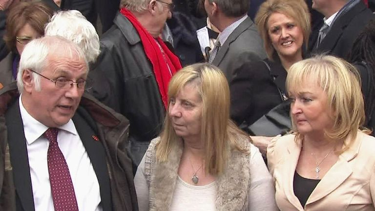 Families of the victims of the Hillsborough disaster outside the High Court