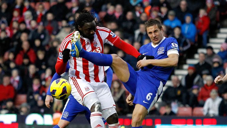 Everton's Phil Jagielka tussles with Stoke striker Kenwyne Jones during the 1-1 draw between the sides in December