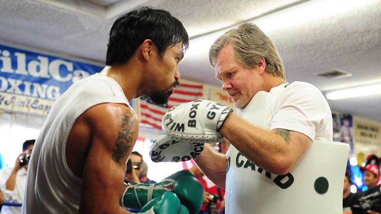 Freddie Roach has urged Manny Pacquiao not to return too soon