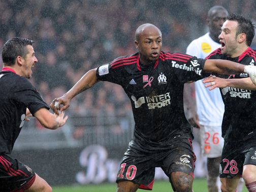 Andre Ayew enjoys his goal for Marseille.