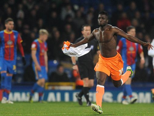 Nouha Dicko celebrates his late leveller for Blackpool