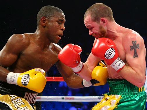 Tough battle: Javier Fortuna throws a left to the body of Patrick Hyland