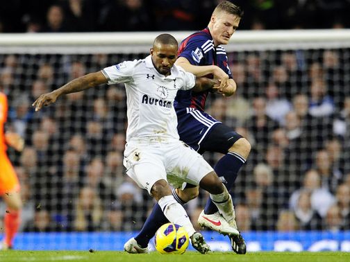 Defoe and Huth compete for possession