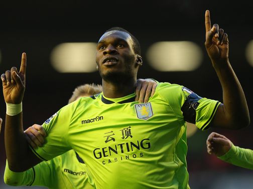 Christian Benteke celebrates at Anfield