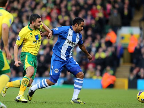 Snodgrass and Beausejour battle for the ball