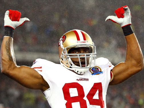 Randy Moss celebrates a 49ers touchdown