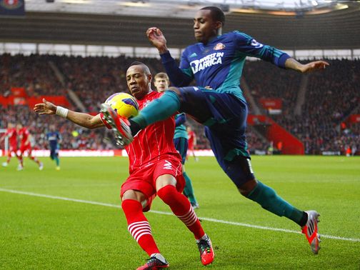 Nathaniel Clyne and Danny Rose battle for the ball