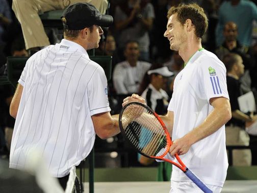 Murray (r) was all smiles despite his defeat to Roddick