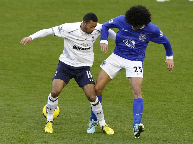 Mousa Dembele and Marouane Fellaini vie for the ball