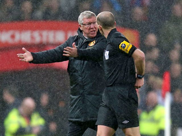 Ferguson has a word with Mike Dean
