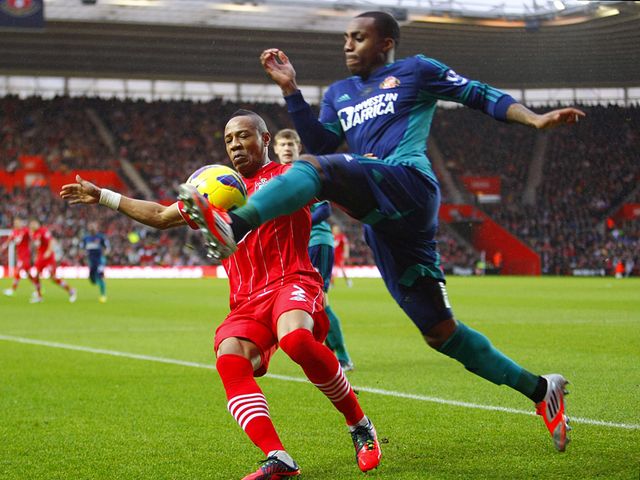 Nathaniel Clyne and Danny Rose battle for the ball