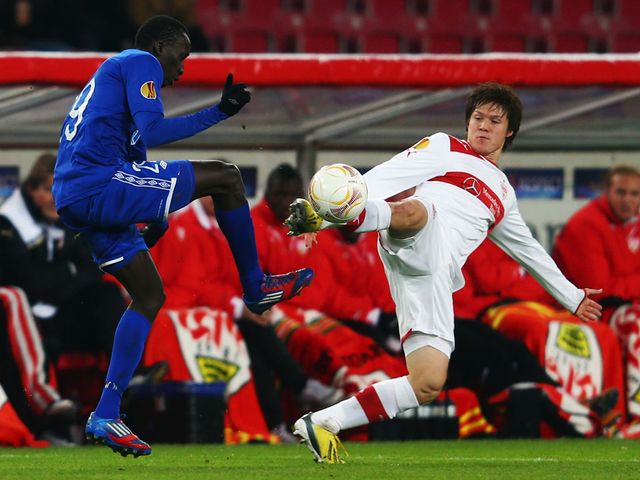 Pape Pate Diouf and Gotoku Sakai battle for possession