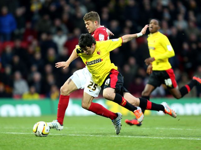 Fernando Forestieri and Martin Cranie battle for the ball
