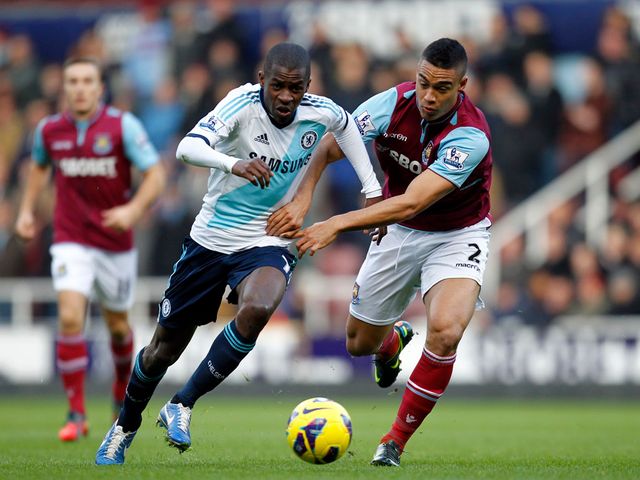 Ramires and Winston Reid battle for the ball