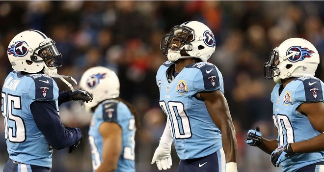 Jason McCourty (c) of the Tennessee Titans celebrates an interception