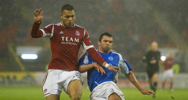 Magennis and Davidson: Battle for the ball