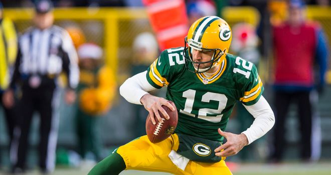 Aaron Rodgers: threw for three touchdowns and also ran for another for Green Bay