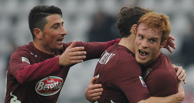 Alessandro Gazzi is mobbed after scoring