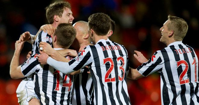 David van Zanten: Mobbed after rare goal sealed victory over Dundee United.