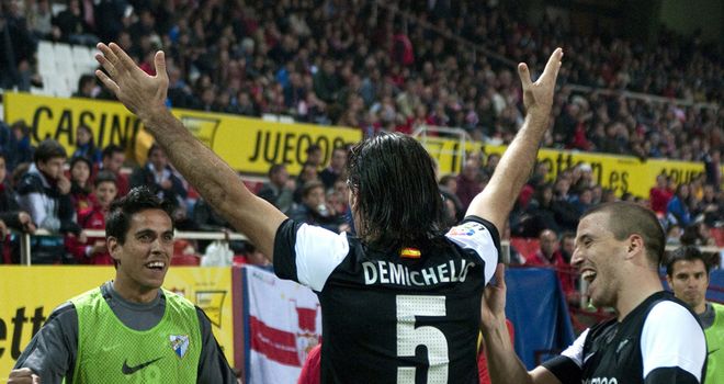 Martin Demichelis celebrates his opener for Malaga