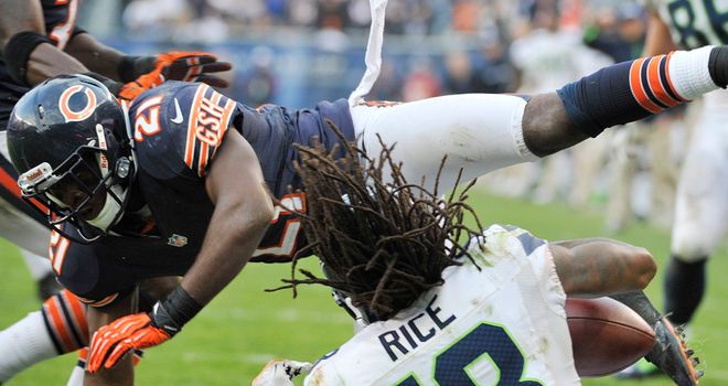 Sidney Rice: Seattle receviver takes a blow as he scores the winning touchdown