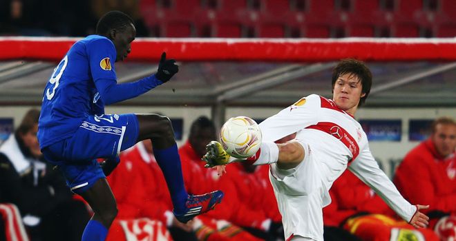 Pape Pate Diouf and Gotoku Sakai battle for possession