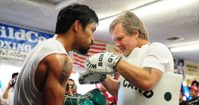 Freddie Roach has urged Manny Pacquiao not to return too soon