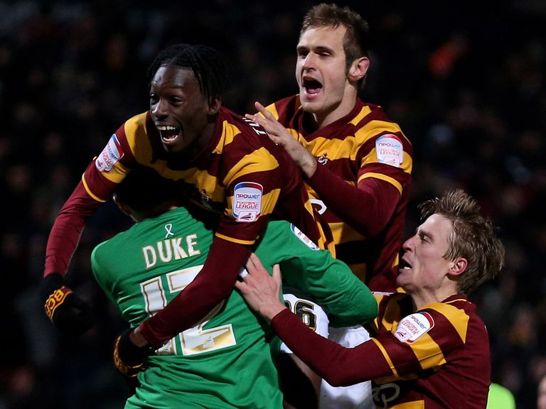 Bradford celebrate their penalty shoot-out victory