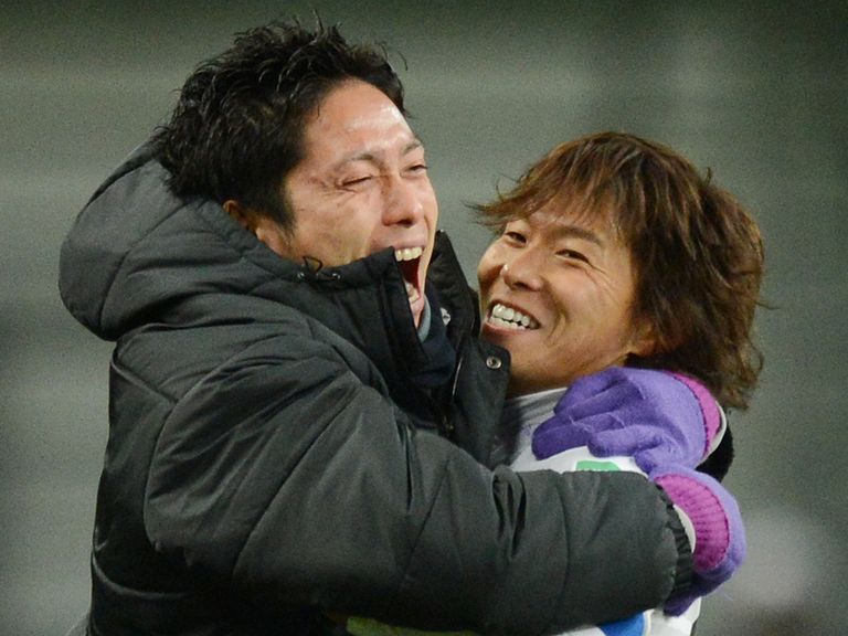 Two-goal Hisato Sato celebrates
