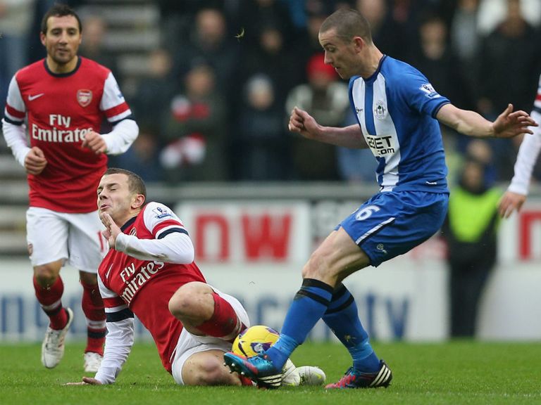 Jack Wilshere gets stuck in at the DW