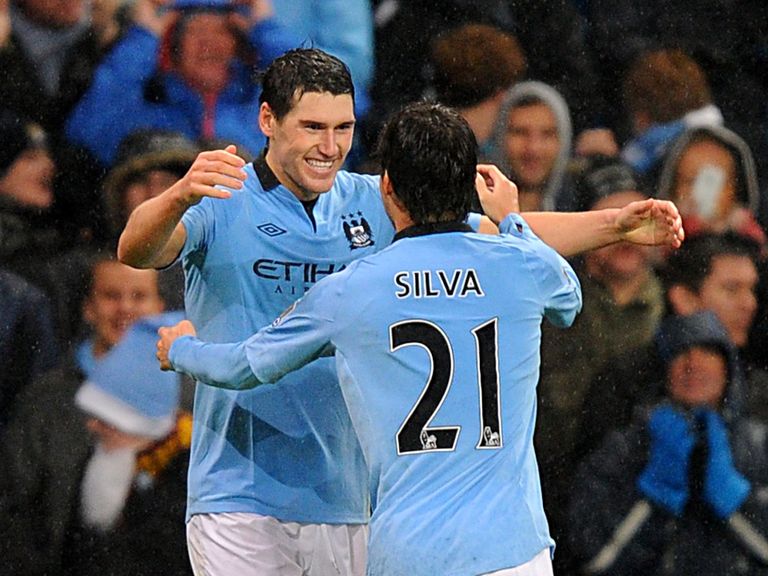 Gareth Barry celebrates his late goal