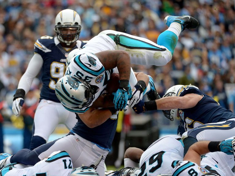 Tolbert dives in to score against his old team