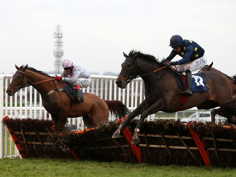 Poet (right) makes a winning start over hurdles