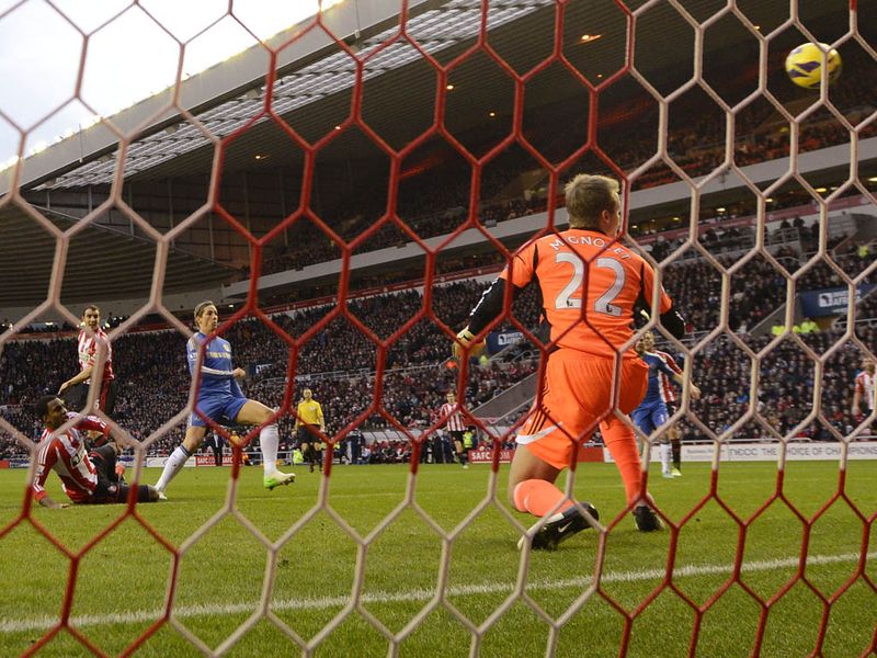 ...firing a volley into the top corner from an Eden Hazard cross.