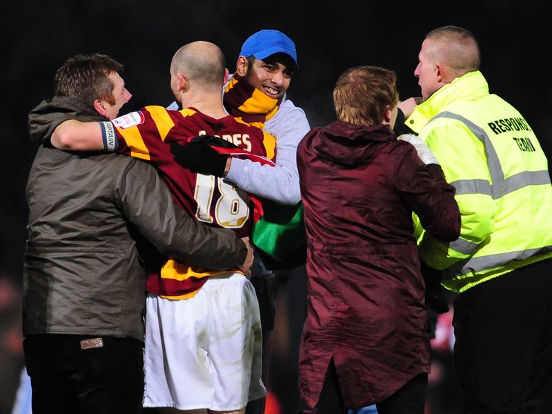 Bradford's fans are mobbed by their doting fans as the Bantams celebrate reaching the Capital One Cup semi-finals