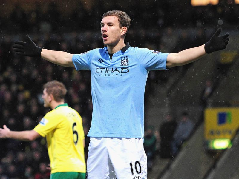Man City take the lead at Carrow Road after just two minutes. Edin Dzeko  applies the finish after being set-up by David Silva.