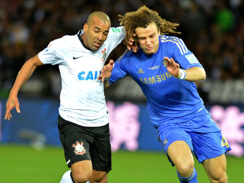 Emerson and David Luiz battled for the ball