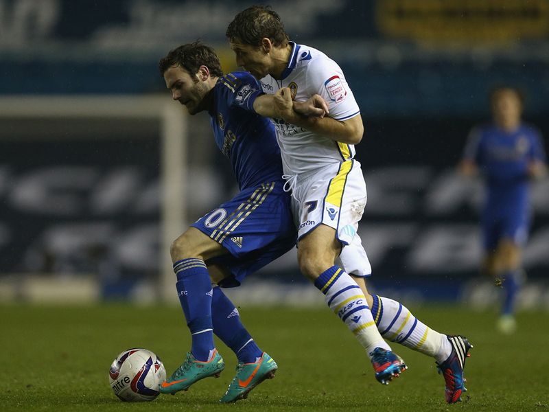 Juan Mata kept the ball away from Michael Brown.