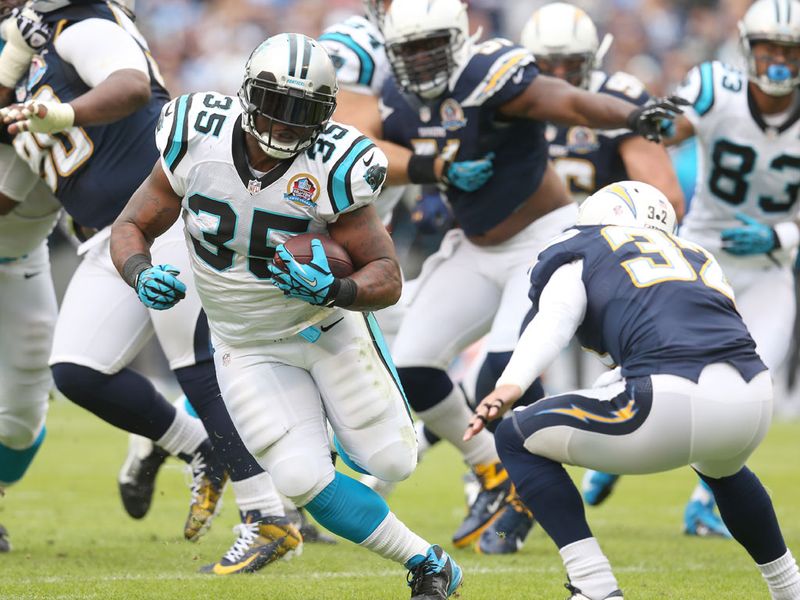 Mike Tolbert helped himself to two touchdowns against former club San Diego as the Carolina Panthers beat the Chargers