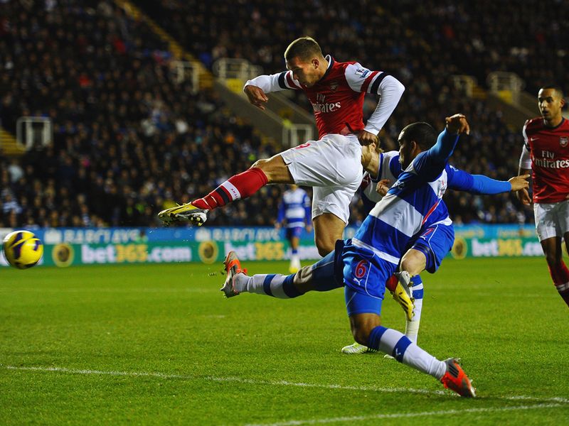 Lucas Podolski fires the Gunners into an early lead at the Madejski Stadium
