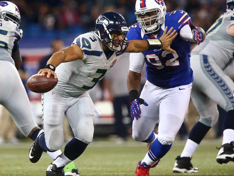 Seattle QB Russell Wilson rushed for three touchdowns as the Seahawks battered the Buffalo Bills in Toronto