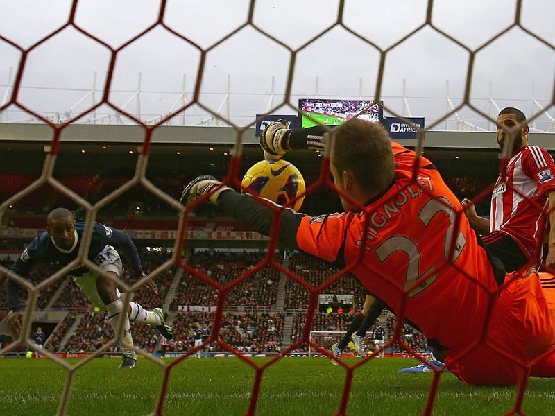 Simon Mignolet pulls off a great save from Jermain Defoe after Gareth Bale puts it on a plate for the England striker. The game finishes 2-1 to Spurs.