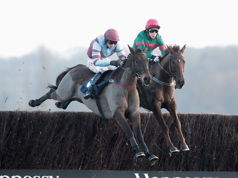 Ballyoliver (left) on his way to winning the opener for Venetia Williams