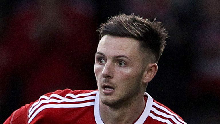 Callum Kennedy: Joins the Dons on a free transfer