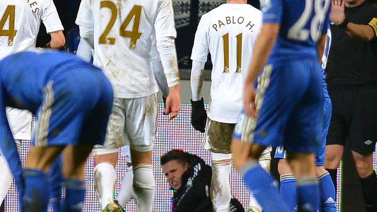 Ballboy: Lies in pain after clash with Eden Hazard