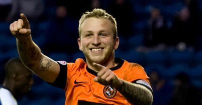 Johnny Russell: Celebrates his hat-trick at Kilmarnock