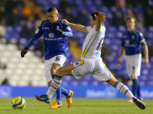 Ravel Morrison and Michael Brown battle for the ball