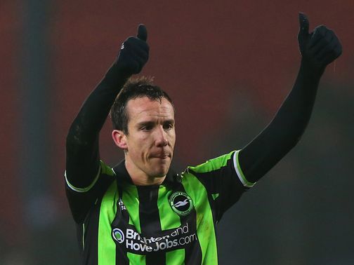 David Lopez celebrates his goal for Brighton