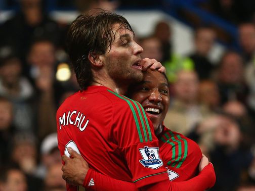 Michu celebrates at Stamford Bridge