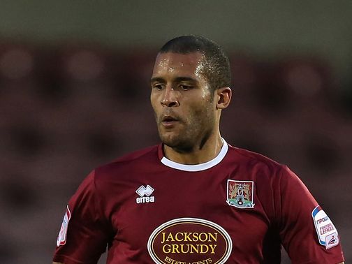 Clarke Carlisle: On target for the Cobblers